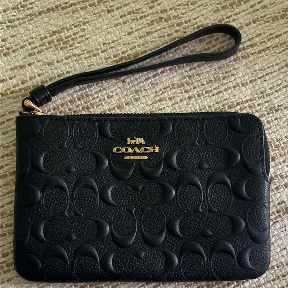 Coach Handbags - NWT Coach Black Embossed Logo Wristlet with Gold Hardware